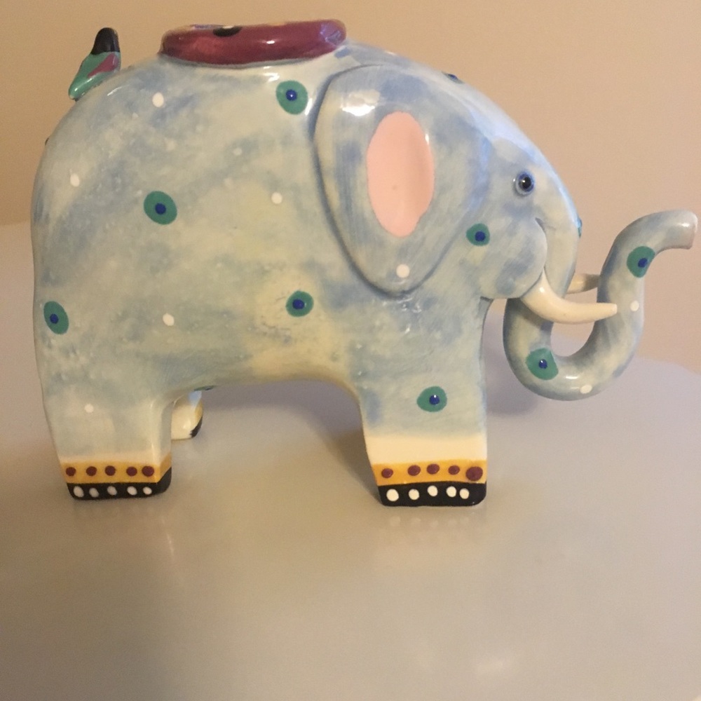 - Ceramic Elephant Candle Holder